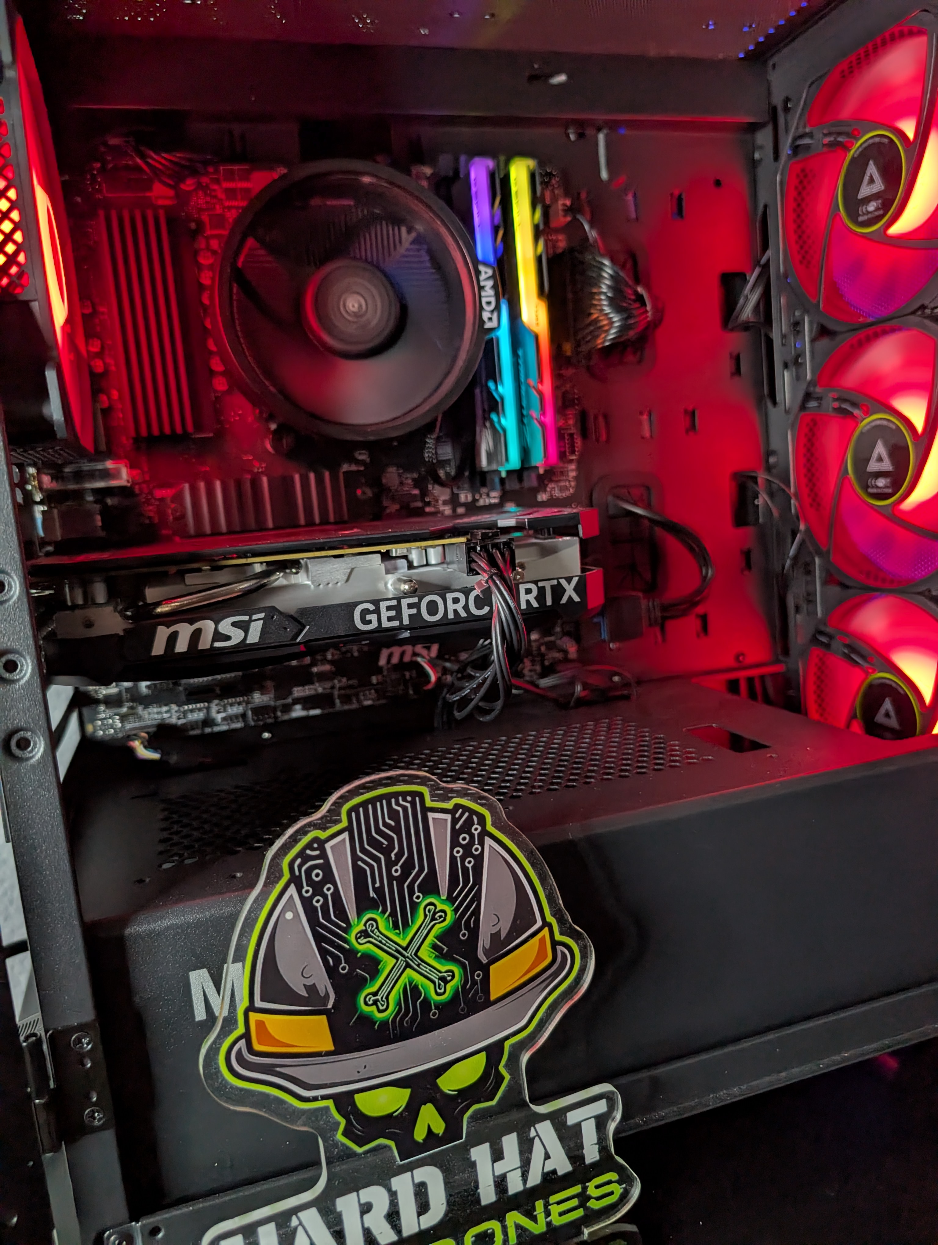 Gaming PC build interior with red lighting