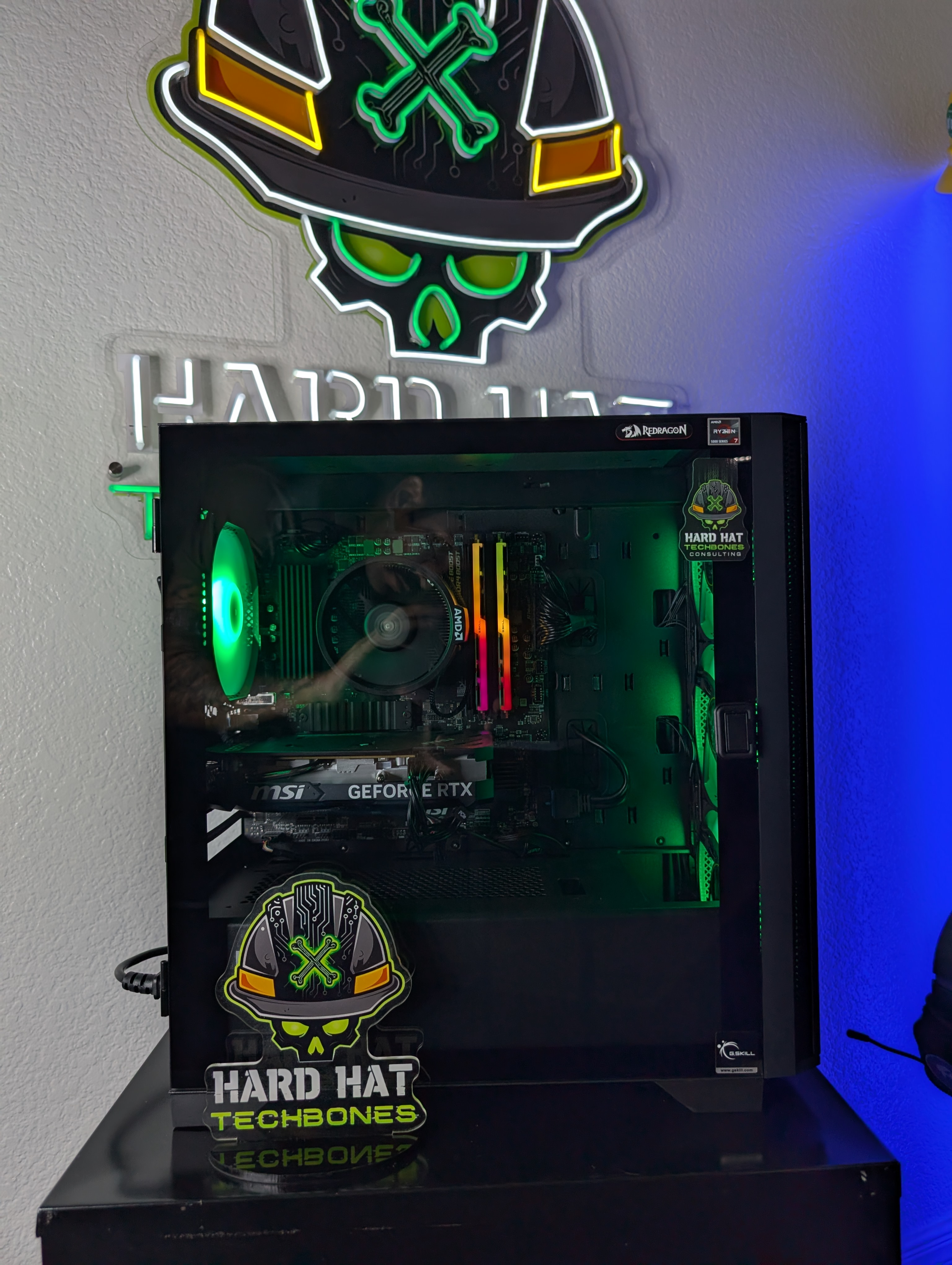 Full view of the custom gaming PC with green lighting